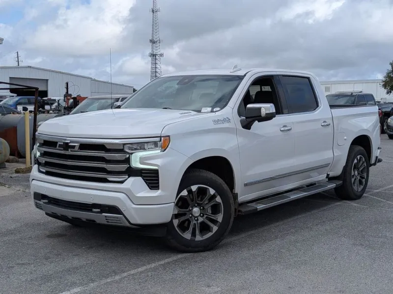 2024 Chevrolet Silverado 1500 High Country in Beige — front three-quarter view