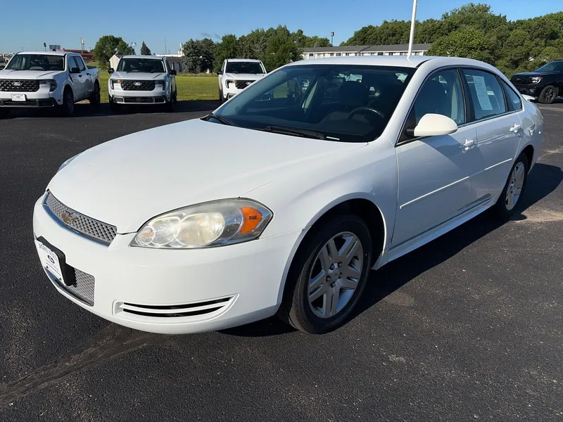 2012 Chevrolet Impala LT FWD in Summit White — front three-quarter view