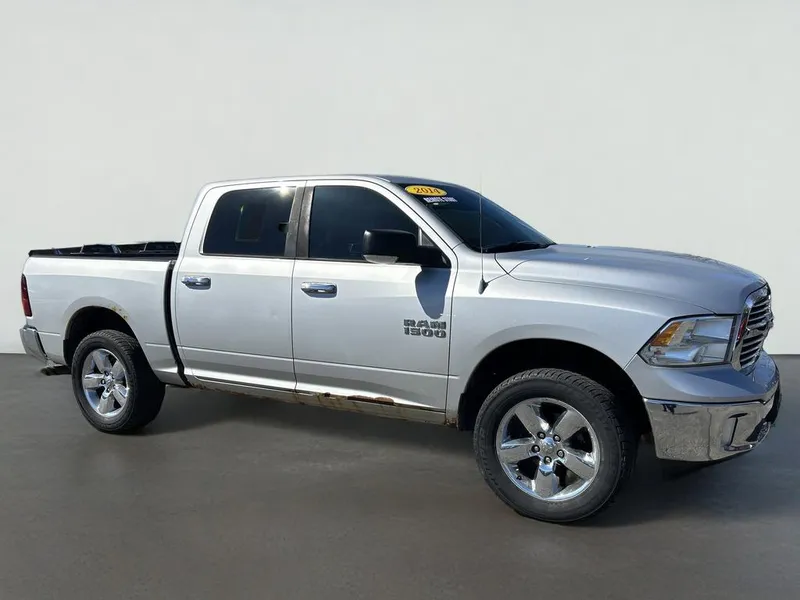 2014 RAM 1500 Big Horn in Bright Silver Metallic Clearcoat — front three-quarter view