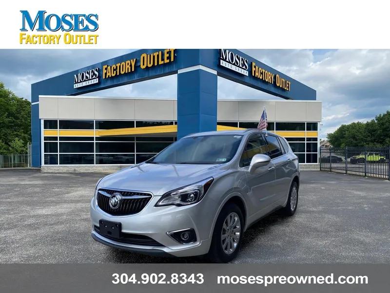 2019 Buick Envision Essence in Summit White — front three-quarter view