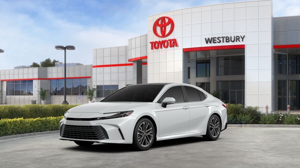 2026 Toyota Camry XLE AWD in Wind Chill Pearl — front three-quarter view