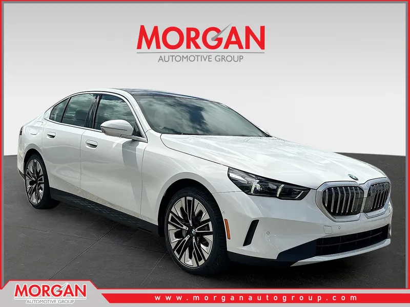 2026 BMW 5 Series 530i in Alpine White — front three-quarter view