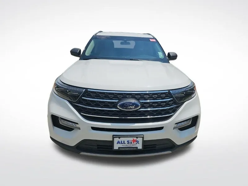 2022 Ford Explorer XLT in Star White Metallic Tri-Coat — front three-quarter view