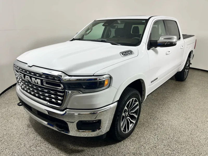 2025 RAM 1500 Longhorn in Bright White Clearcoat — front three-quarter view