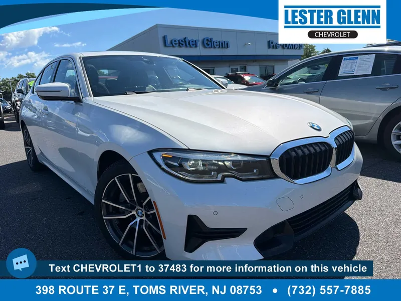 2019 BMW 330i xDrive in White — front three-quarter view