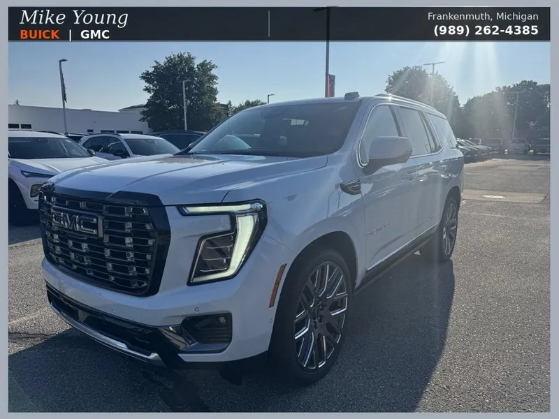 2026 GMC Yukon Denali Ultimate in Glacier White Tricoat — front three-quarter view