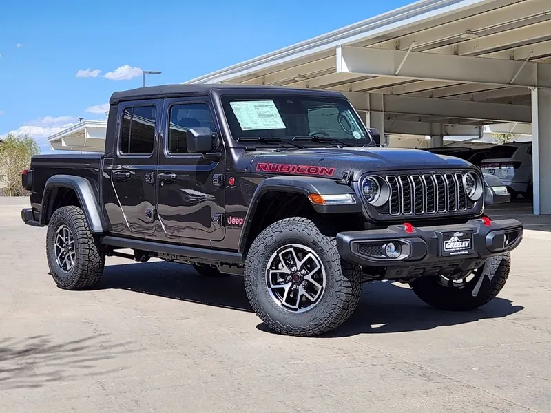 2026 Jeep Gladiator GLADIATOR RUBICON 4X4 in Granite Crystal Metallic Clear-Coat Exterior Paint — front three-quarter view