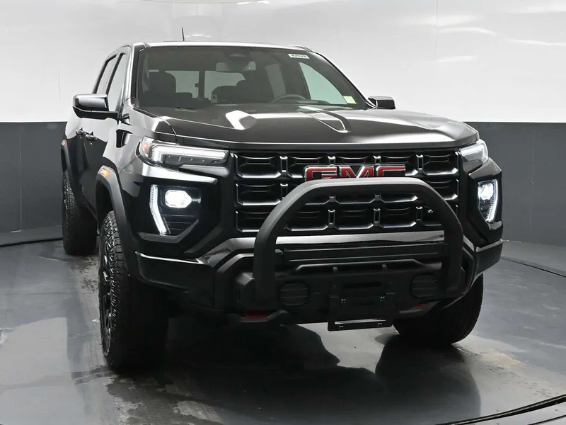 2026 GMC Canyon AT4 in Onyx Black — front three-quarter view