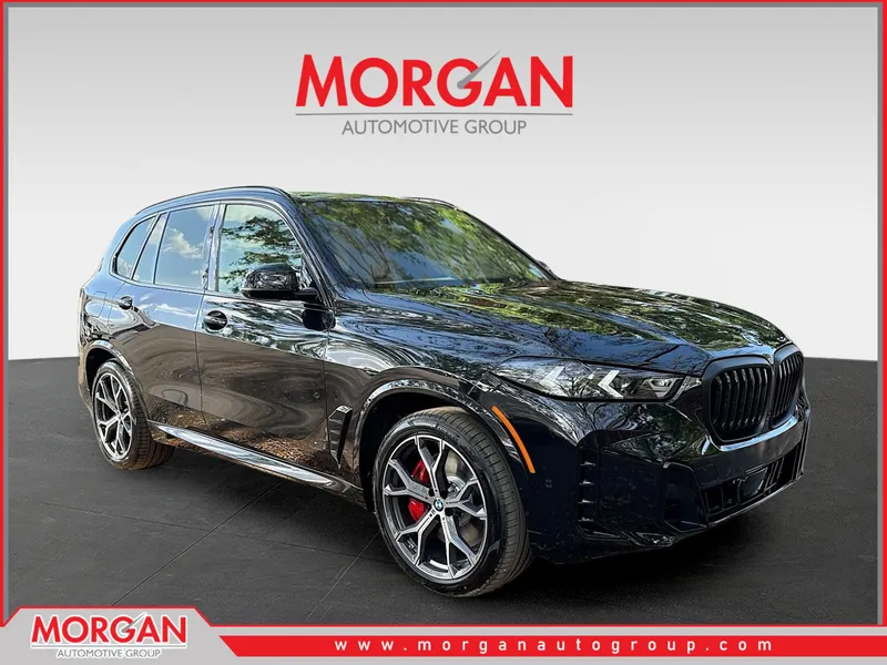 2026 BMW X5 xDrive50e in Black Sapphire Metallic — front three-quarter view