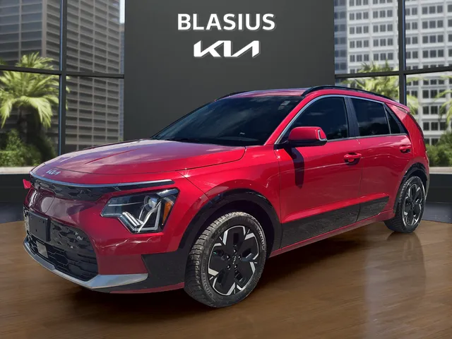 2023 Kia Niro EV Wind in Runway Red — front three-quarter view
