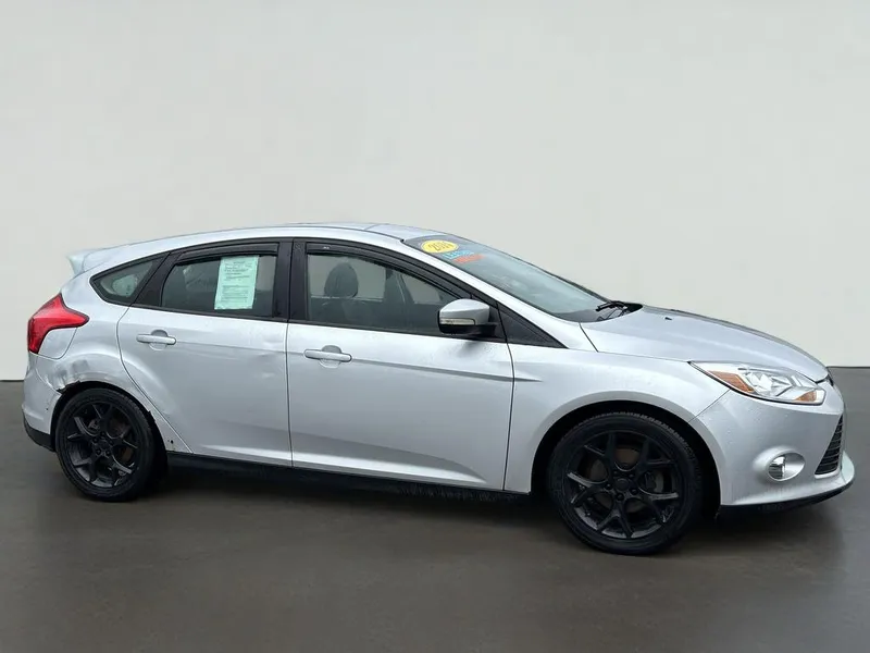 2014 Ford Focus SE in Silver — front three-quarter view