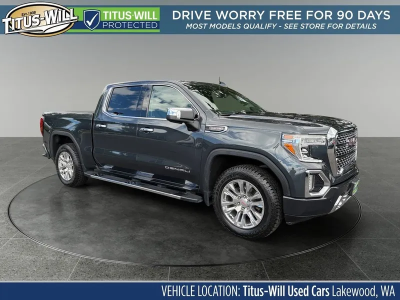 2021 GMC Sierra 1500 Denali in Hunter Green — front three-quarter view
