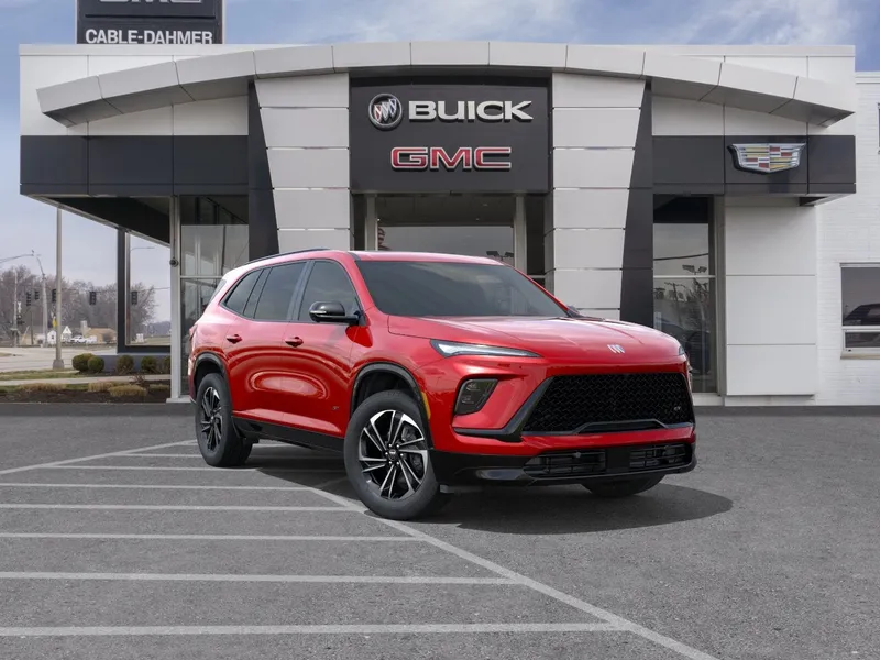 2026 Buick Enclave Sport Touring in Cherry Red Tintcoat — front three-quarter view