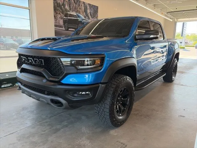 2022 RAM 1500 TRX Crew Cab 4x4 5'7' Box in Blue Pearl — front three-quarter view