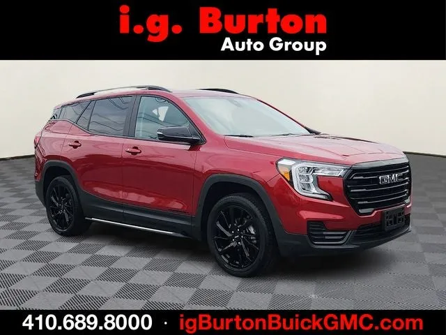 2023 GMC Terrain SLE Elevation in Volcanic Red Tintcoat — front three-quarter view