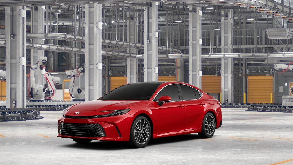 2026 Toyota Camry XLE AWD in Supersonic Red — front three-quarter view