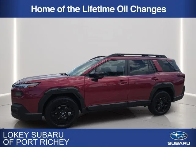 2026 Subaru Outback Limited in Crimson Red Pearl — front three-quarter view