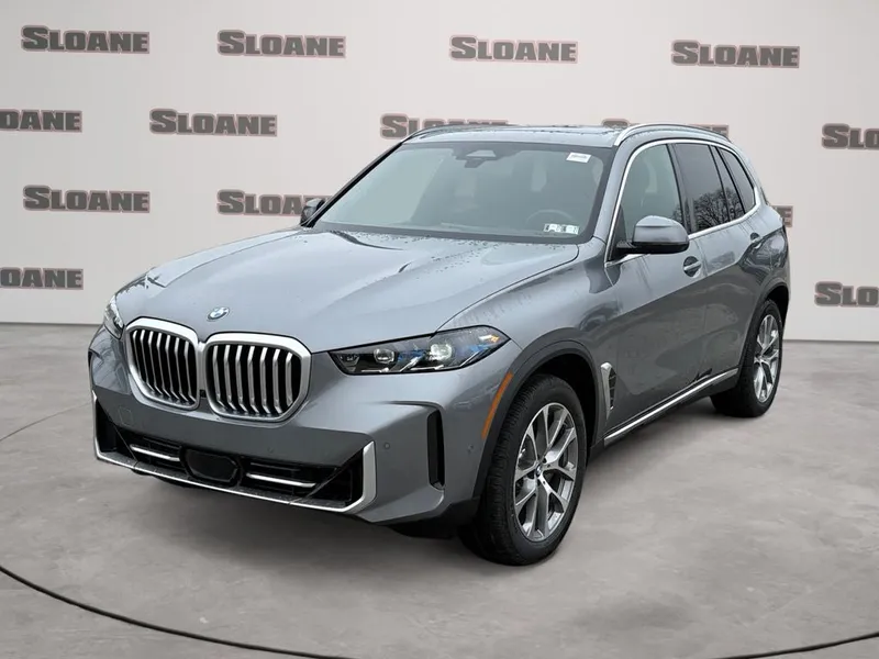 2026 BMW X5 xDrive40i in Skyscraper Grey Metallic — front three-quarter view