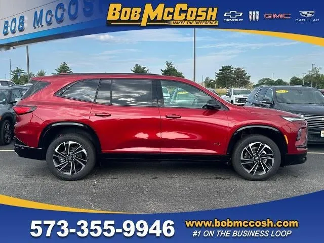 2026 Buick Enclave Sport Touring in Cherry Red Tintcoat — front three-quarter view