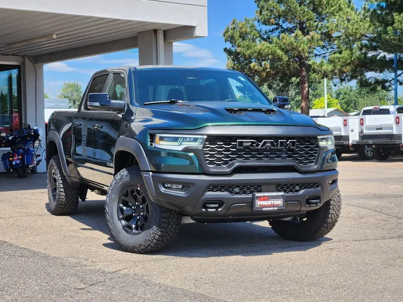 2026 RAM 1500 RAM 1500 RHO CREW CAB 4X4 5'7' BOX in Serrano-Green Metallic Exterior Paint — front three-quarter view