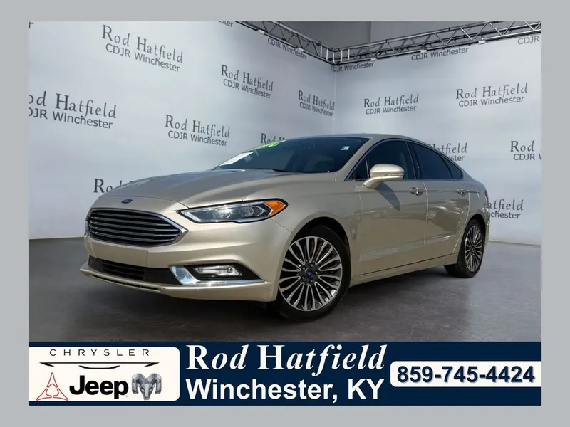 2017 Ford Fusion Titanium in White Gold — front three-quarter view
