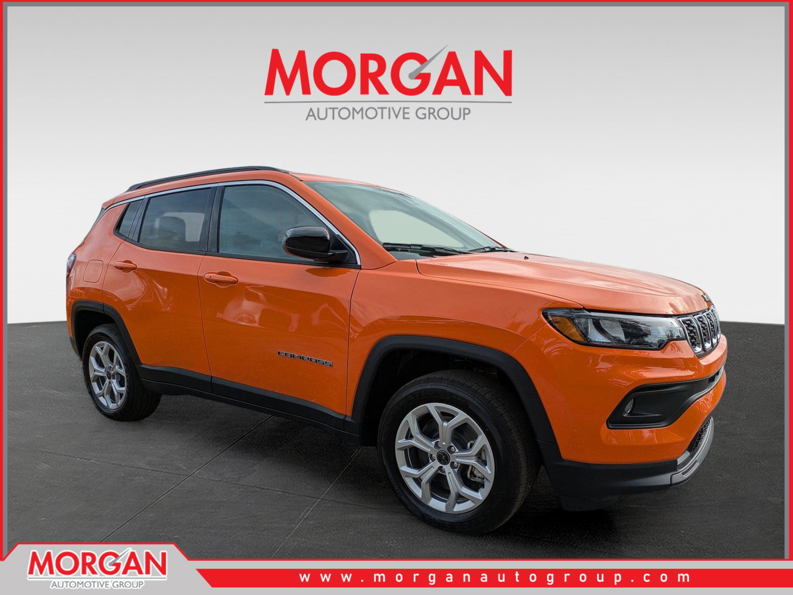 2026 Jeep Compass Latitude in Orange — front three-quarter view