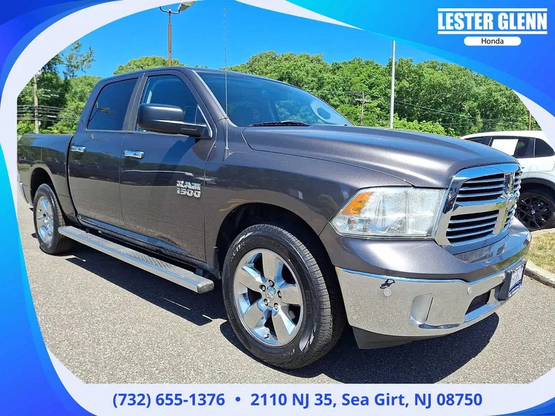 2014 RAM 1500 Big Horn in Granite Crystal Metallic Clearcoat — front three-quarter view