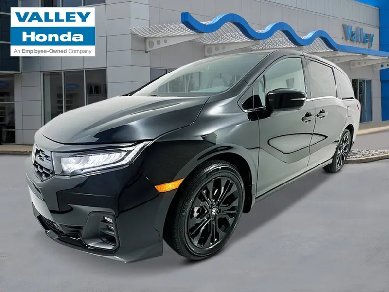 2026 Honda Odyssey Sport-L in Crystal Black Pearl — front three-quarter view