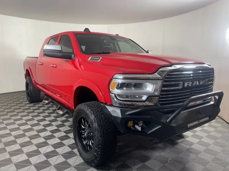 2019 RAM 3500 Laramie Mega Cab 4x4 6'4' Box in Flame Red Clearcoat — front three-quarter view