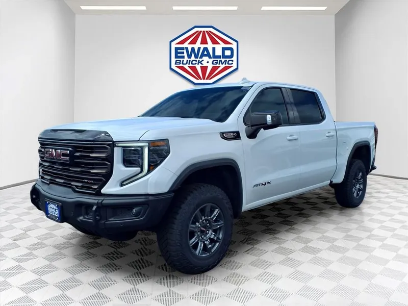 2026 GMC Sierra 1500 AT4X in Summit White — front three-quarter view