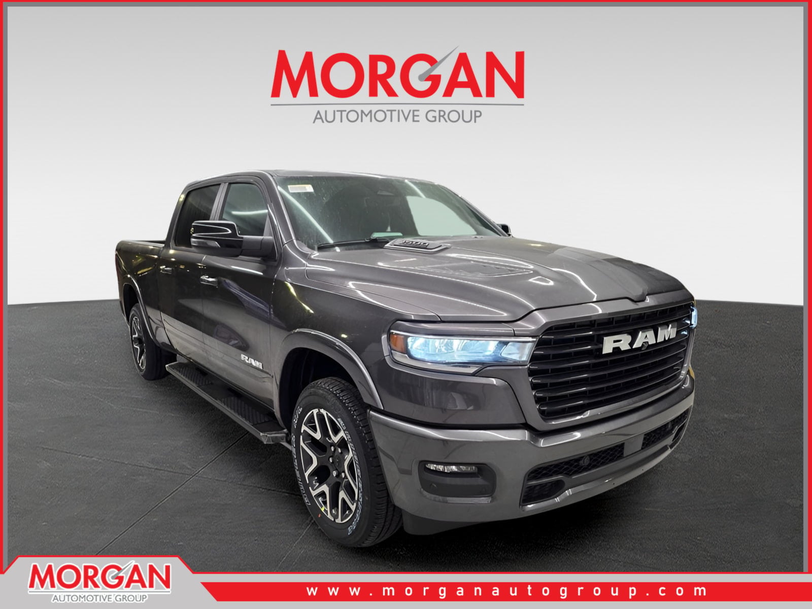 2026 Ram 1500 Laramie in Granite Crystal Metallic Clearcoat — front three-quarter view