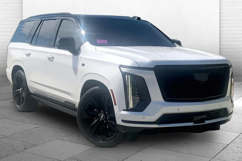 2025 Cadillac Escalade Sport in Crystal White Tricoat — front three-quarter view