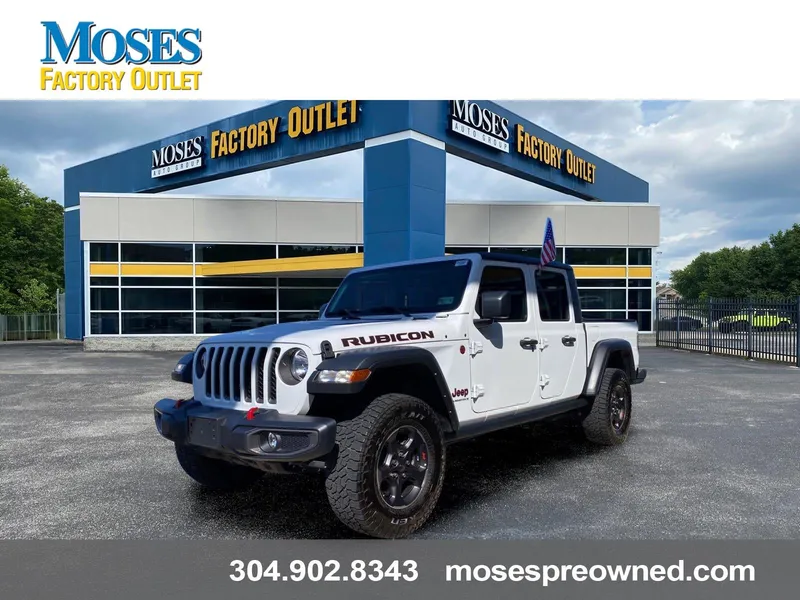 2023 Jeep Gladiator Rubicon in Bright White Clearcoat — front three-quarter view