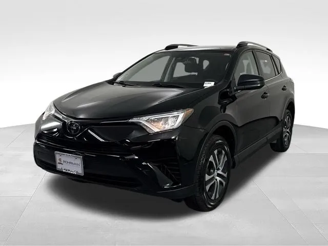 2017 Toyota RAV4 LE in Black — front three-quarter view