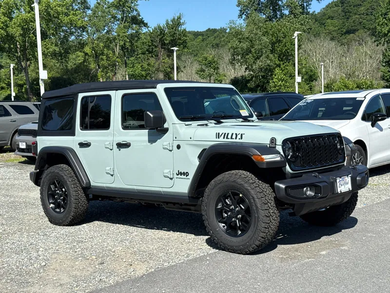 2026 Jeep Wrangler Willys in Earl Clearcoat — front three-quarter view