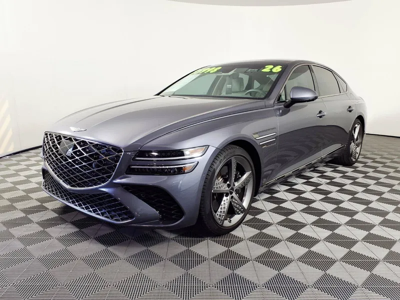 2026 Genesis G80 3.5T Sport Prestige in Ceres Blue — front three-quarter view