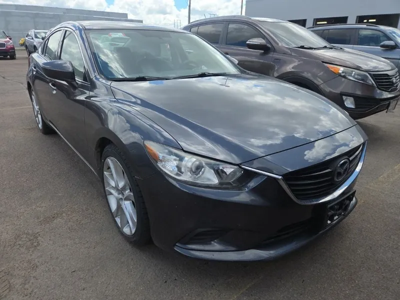 2016 Mazda Mazda6 i Touring in Meteor Gray Mica — front three-quarter view