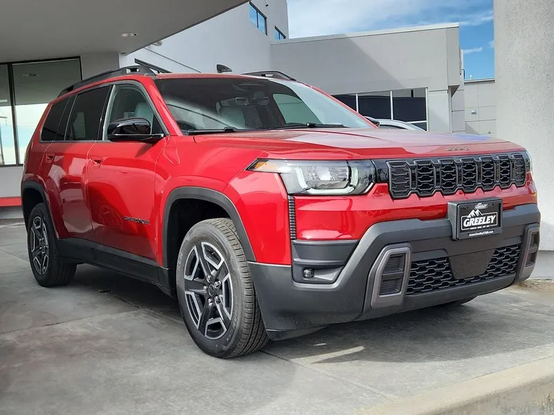 2026 Jeep Cherokee CHEROKEE LAREDO 4X4 in Red Hot Pearl-Coat Exterior Paint — front three-quarter view