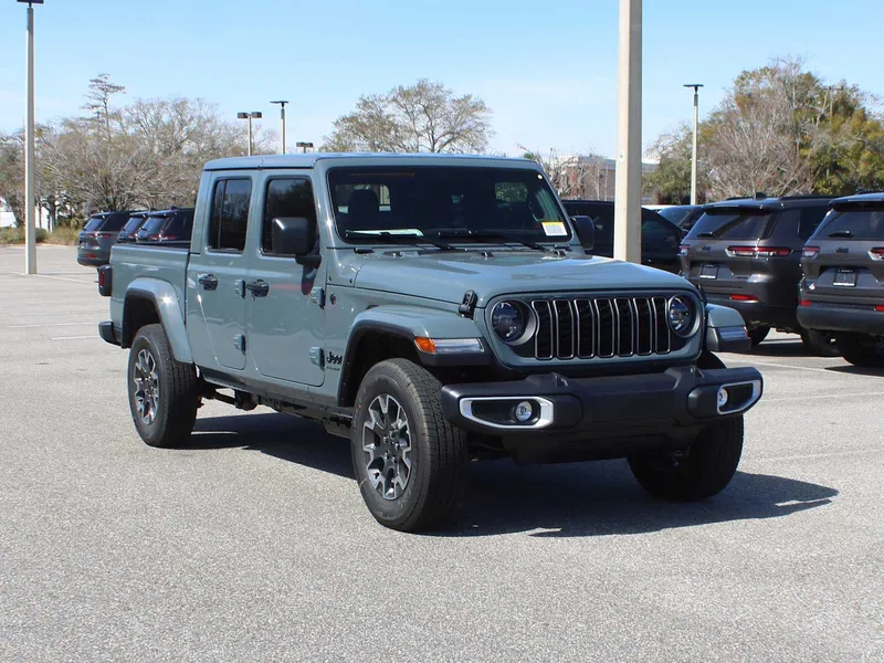 2026 Jeep Gladiator Sahara in Anvil Clear-Coat Exterior Paint — front three-quarter view