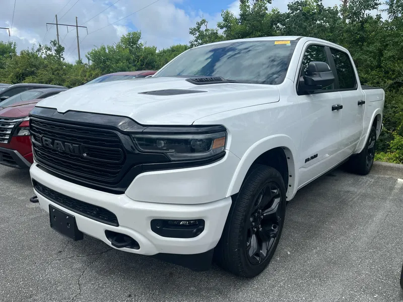 2024 RAM 1500 Limited in Ivory White Tri-Coat Pearlcoat — front three-quarter view