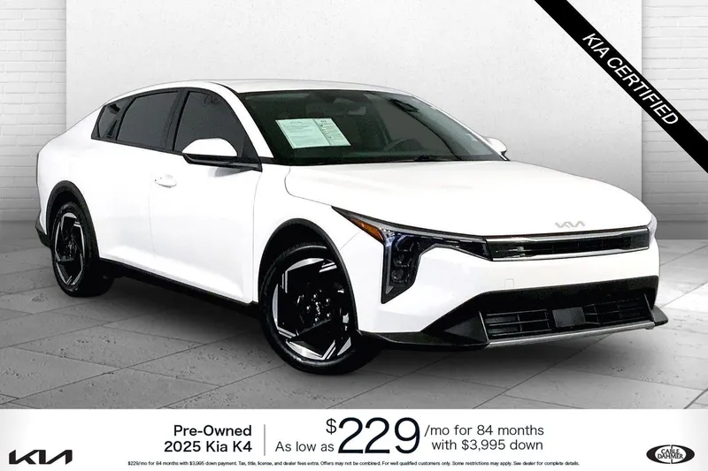 2025 Kia K4 EX in Snow White Pearl — front three-quarter view