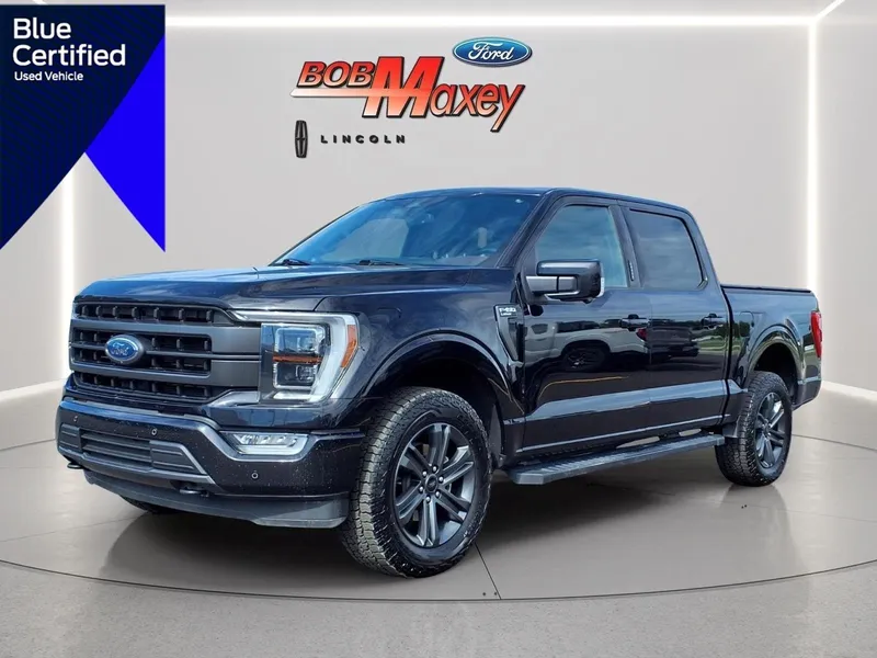 2023 Ford F-150 Lariat in Agate Black Um — front three-quarter view