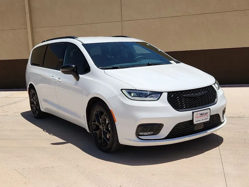 2024 Chrysler Pacifica Touring L S package in Bright White Clearcoat — front three-quarter view