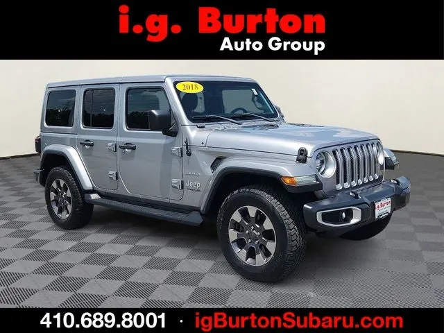 2018 Jeep Wrangler Unlimited Sahara in Billet Silver Metallic — front three-quarter view
