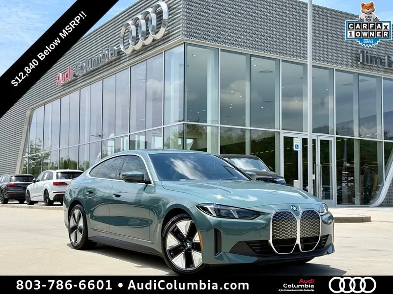 2025 BMW i4 eDrive40 in Cape York Green Metallic — front three-quarter view