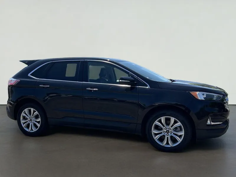 2024 Ford Edge Titanium in Black — front three-quarter view