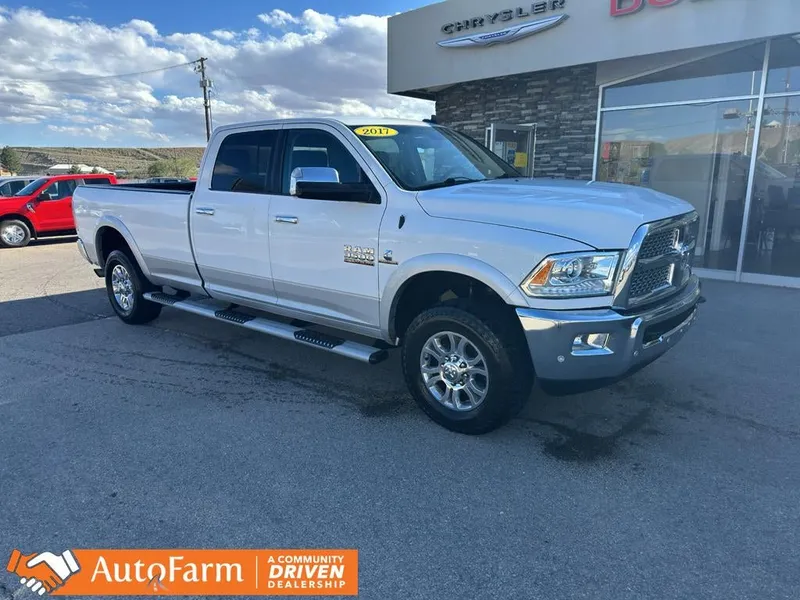 2017 RAM 3500 Laramie in Bright White Clearcoat — front three-quarter view