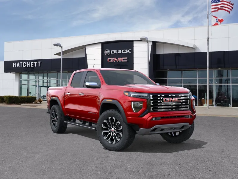 2026 GMC Canyon Denali in Volcanic Red Tintcoat — front three-quarter view