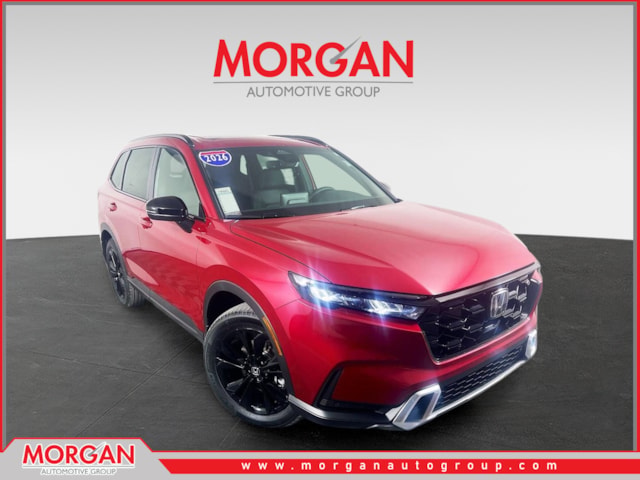 2026 Honda CR-V Hybrid Sport Touring in Red — front three-quarter view