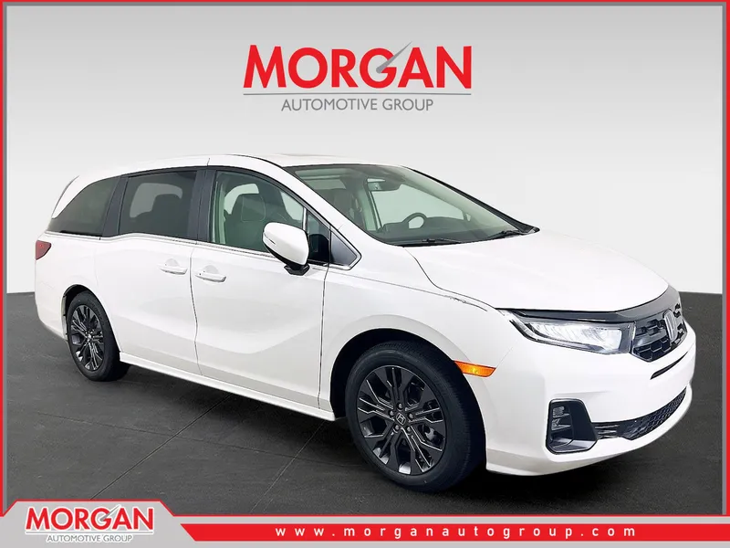 2026 Honda Odyssey Touring in White — front three-quarter view